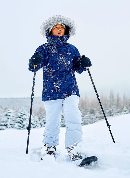 Femme qui pratique le Ski Hok
